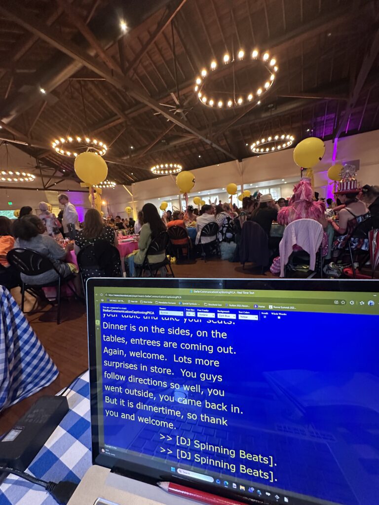 Live CART captioning services displayed during a large public event